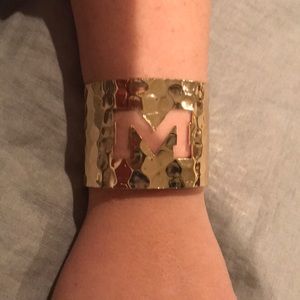 hammered gold M cuff.